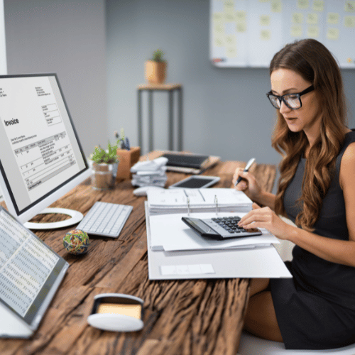 A bookkeeper with Desktop Computer